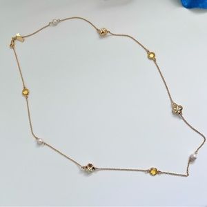 Kate Spade necklace in gold with faux pearl